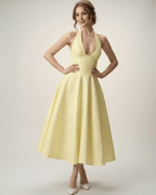 Elara Midi Dress in elegant yellow, featuring a halter A-line silhouette with structured fit by Lauven.