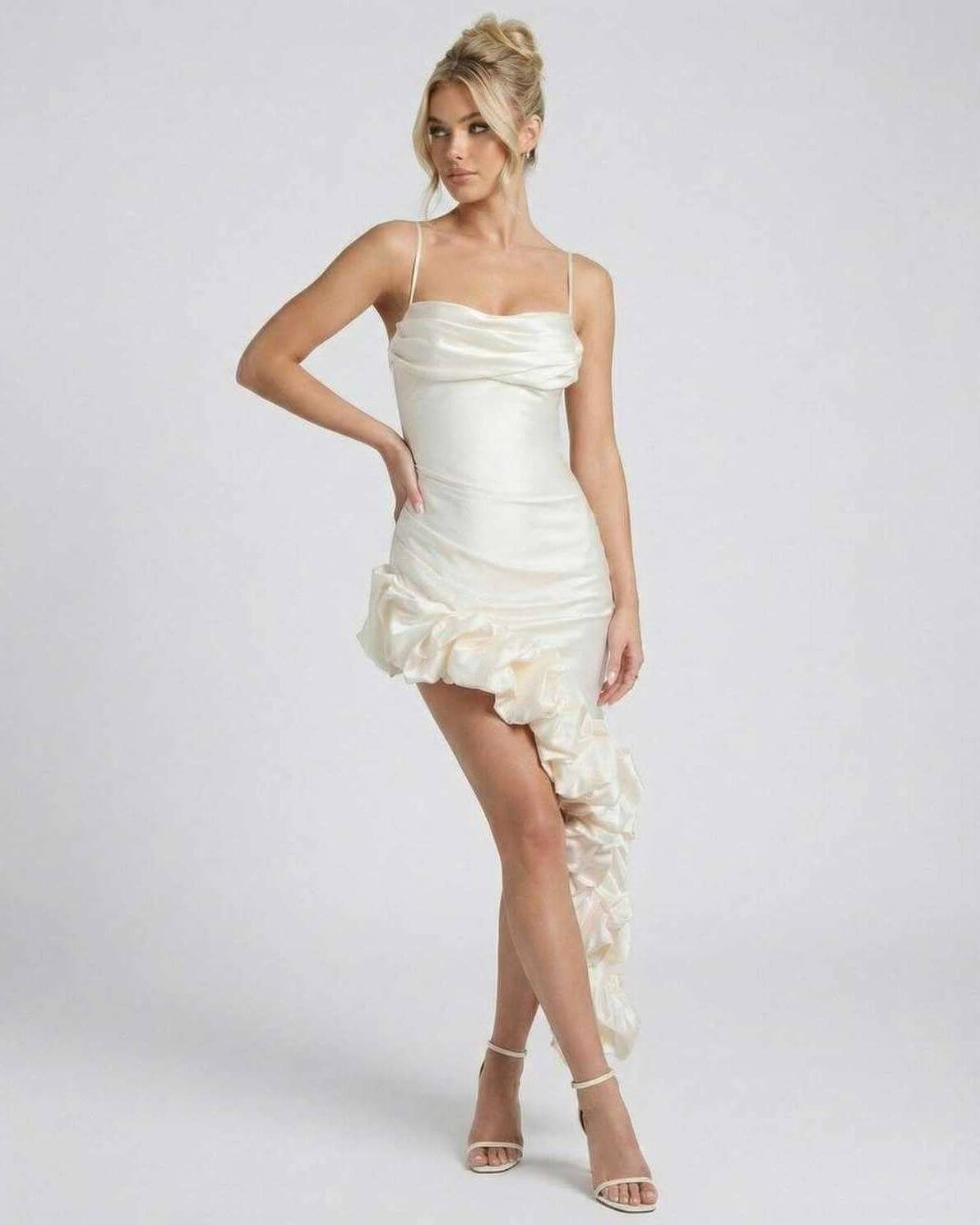 Elara Midi Dress by Lauven, featuring elegant satin fabric and asymmetric ruffle hem for a modern feminine look.