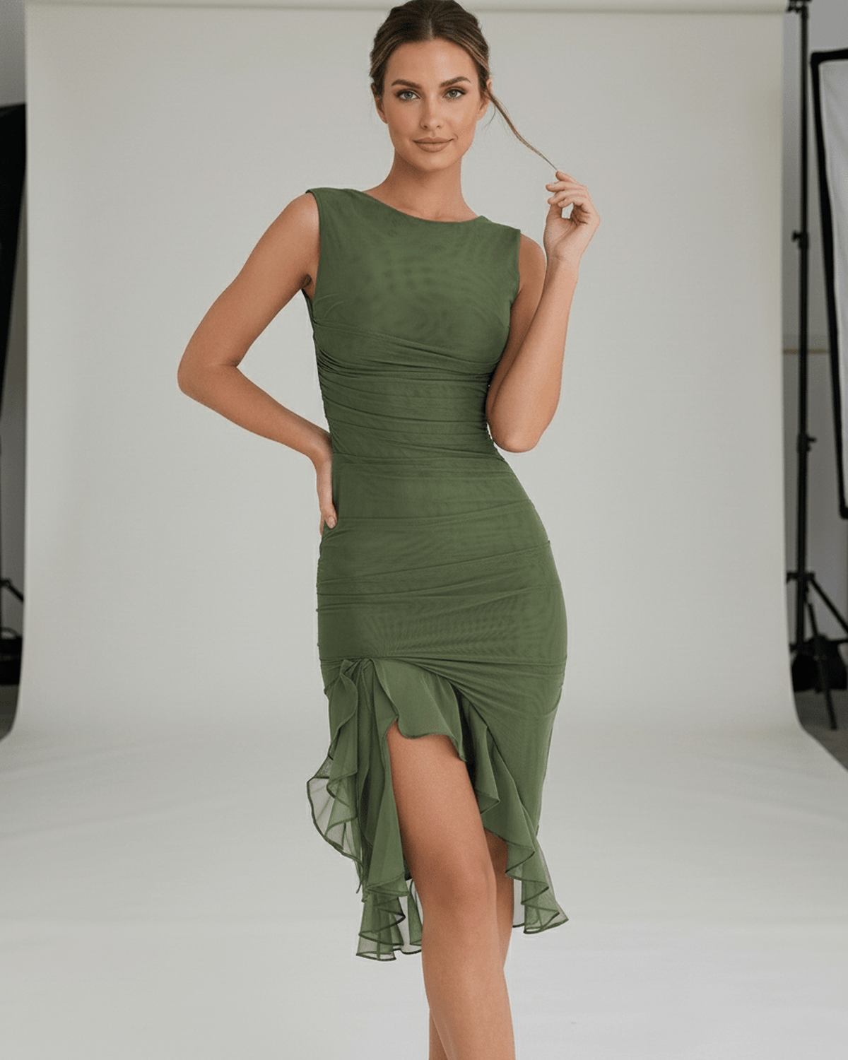 Elara Midi Dress - Elegant green ruched midi dress with ruffle hem, showcasing sleeveless fit by Lauven.