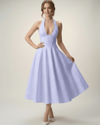 Elara Midi Dress in lavender, featuring an elegant halter neckline and A-line skirt by Lauven, perfect for any special occasion.
