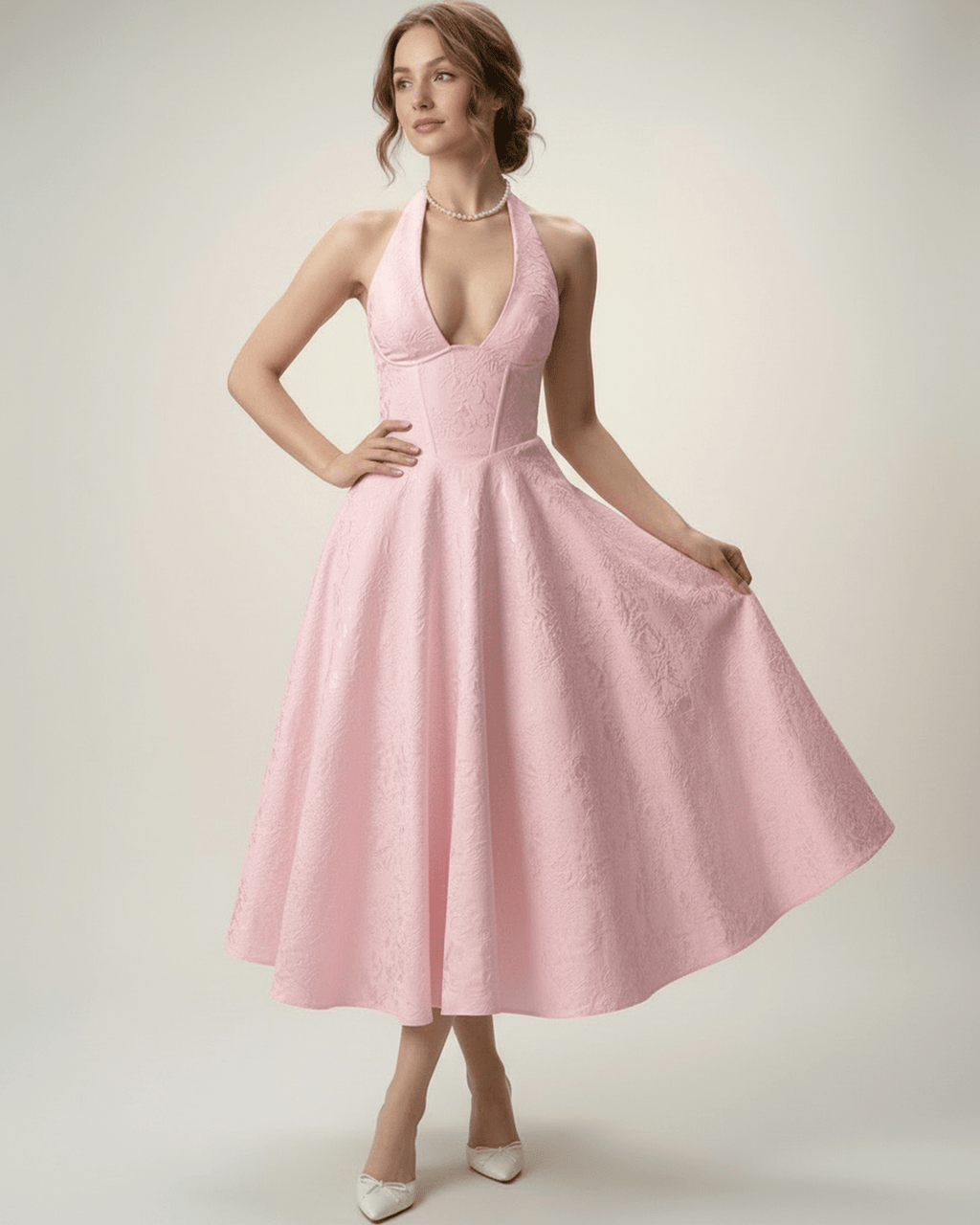 Elara Midi Dress with a halter neckline and A-line silhouette, offering elegance and sophistication by Lauven.