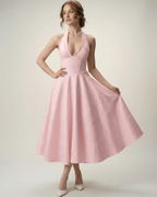 Elara Midi Dress with a halter neckline and A-line silhouette, offering elegance and sophistication by Lauven.