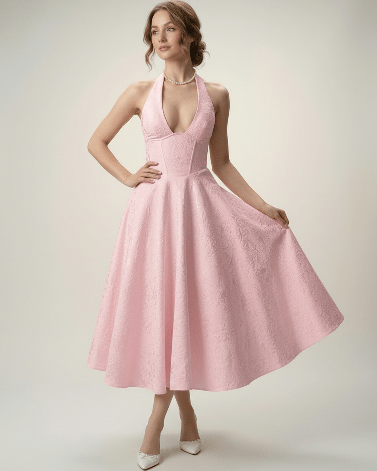 Elara Midi Dress with a halter neckline and A-line silhouette, offering elegance and sophistication by Lauven.