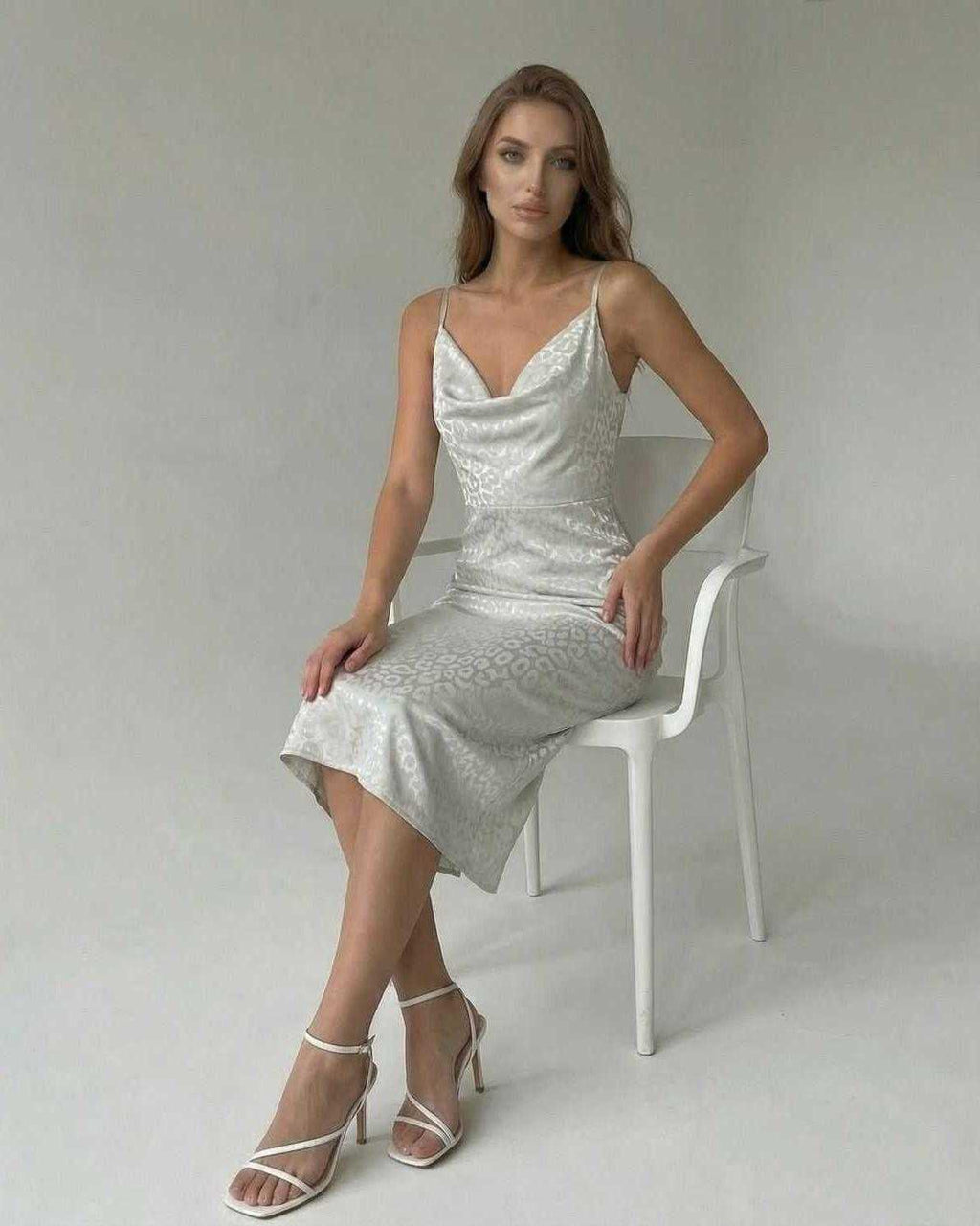 Elara Midi Dress by Lauven, satin-effect spaghetti strap dress for elegant evenings.