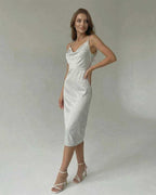 Elara Midi Dress by Lauven in satin-effect, showcasing a sleek silhouette with spaghetti straps and elegant design.