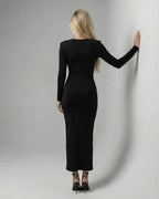 Elara Midi Dress by Lauven, sleek black sheath dress showcasing a slim fit silhouette from the back.