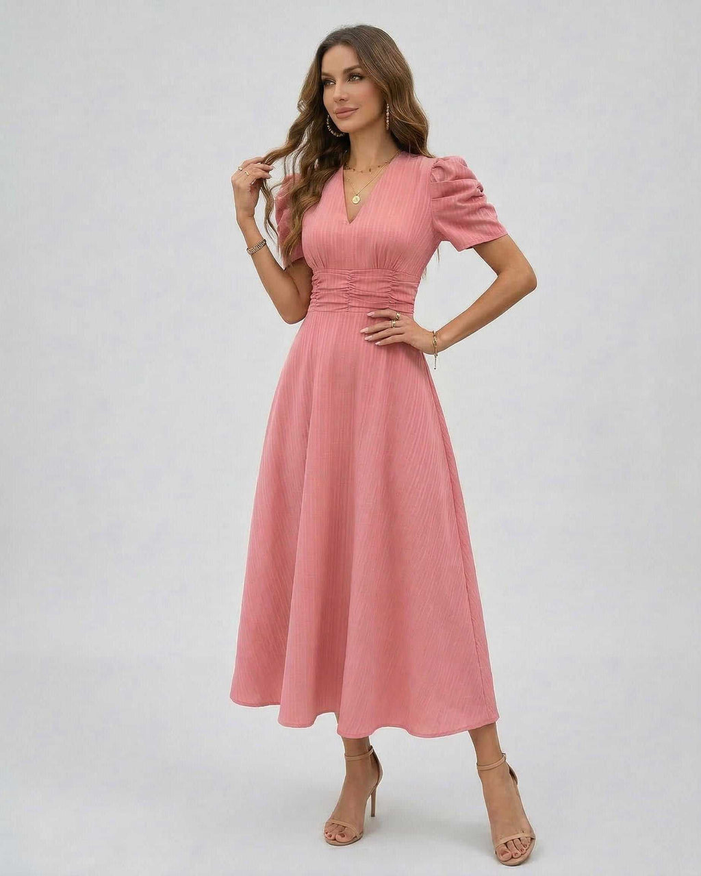 Elara Midi Dress in soft pink with puffed sleeves, V-neck, and cinched waist by Lauven, perfect for weddings and cocktails.