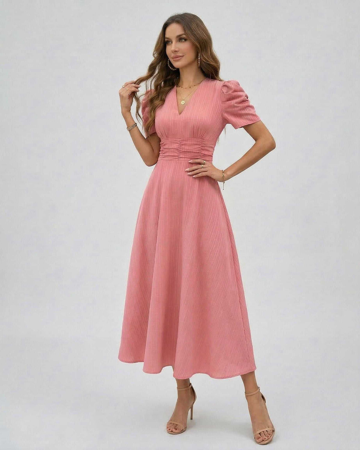 Elara Midi Dress in soft pink with puffed sleeves, V-neck, and cinched waist by Lauven, perfect for weddings and cocktails.