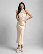 Elara Midi Dress - elegant satin halter neck design in champagne, exuding luxury and sophistication by Lauven.
