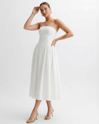 Elara Midi Dress by Lauven, strapless white pleated dress featuring a sculpted silhouette and elegant movement.