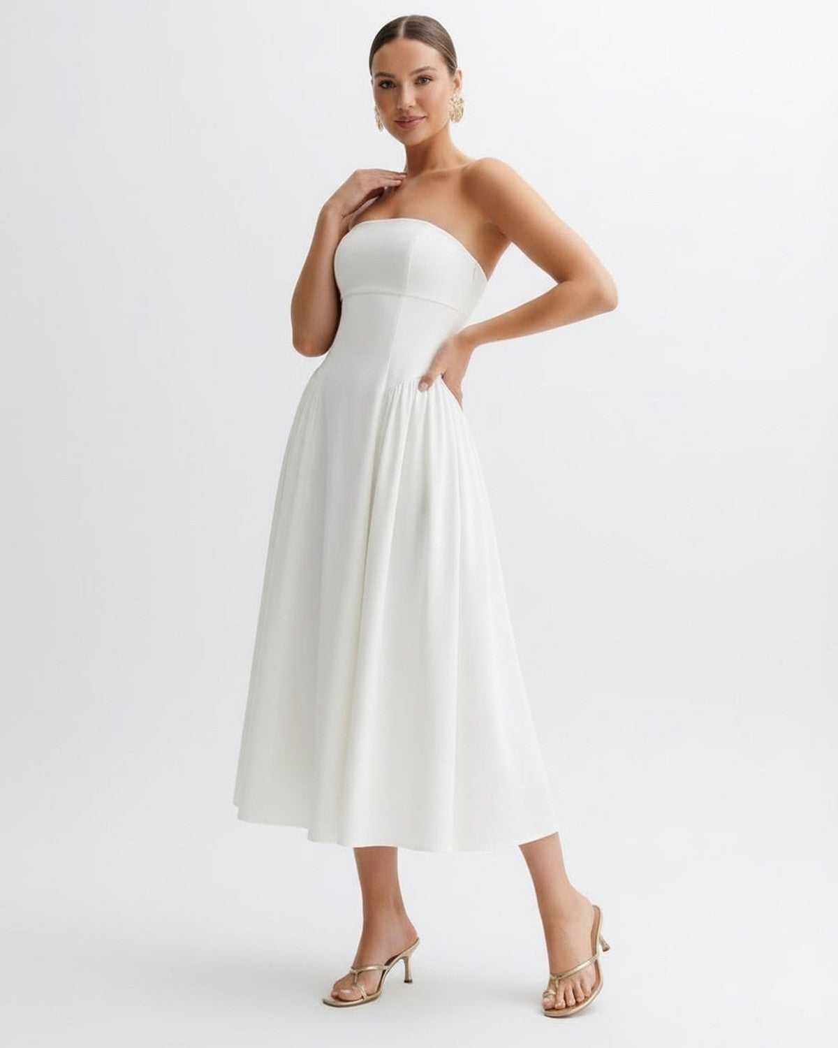 Elara Midi Dress - Strapless white midi dress with pleats, enhancing natural shape, by Lauven, perfect for elegance and grace.