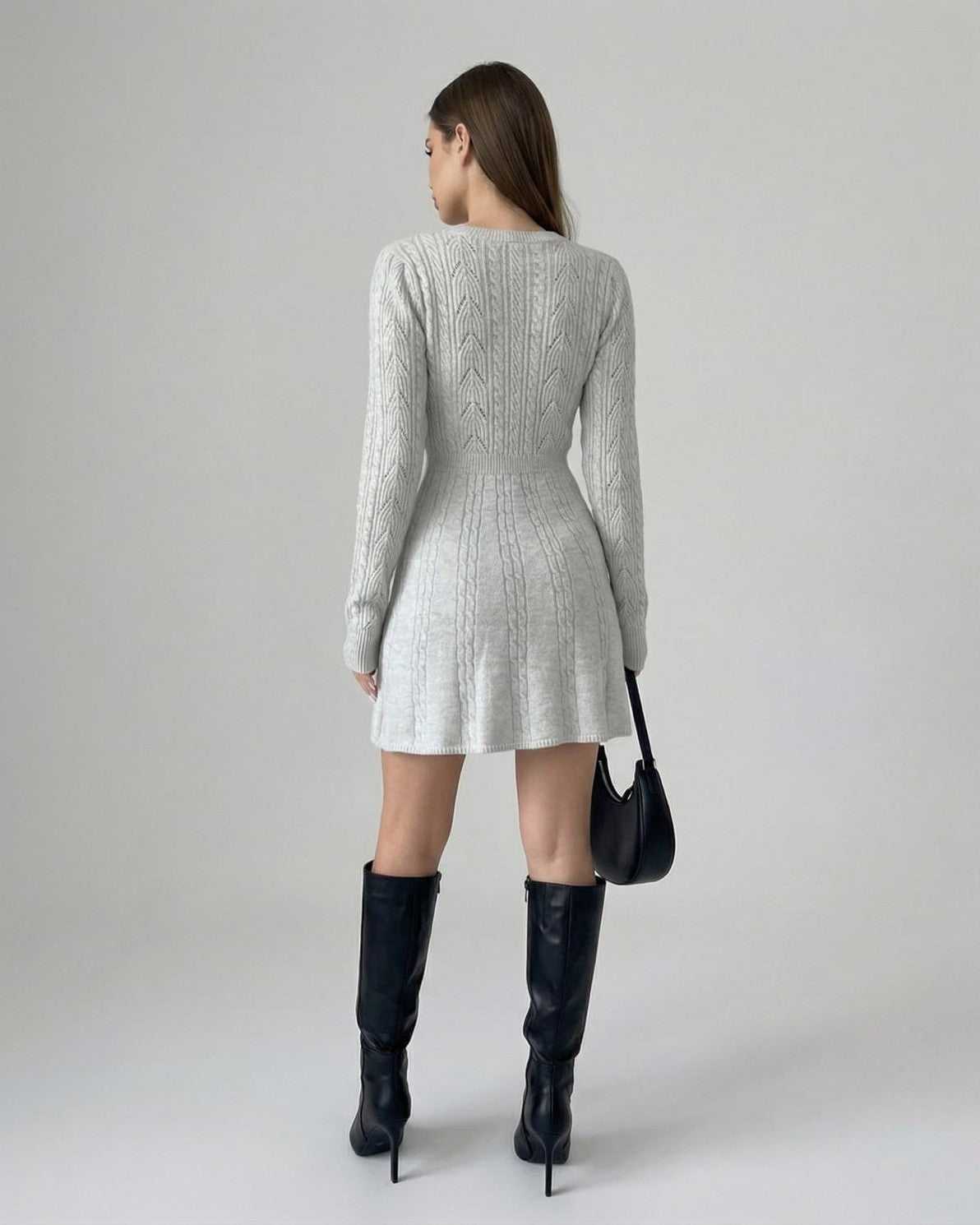 Elara Mini Dress by Lauven - Long Sleeve Knit design with Bow Detail, showcasing a polished silhouette in a light grey color.