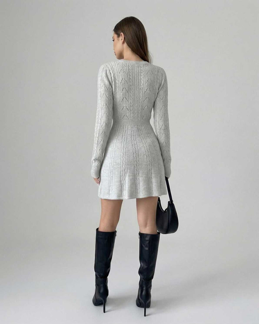 Elara Mini Dress by Lauven - Long Sleeve Knit design with Bow Detail, showcasing a polished silhouette in a light grey color.