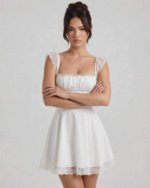 Elara Mini Dress by Lauven - White lace A-line dress with structured bodice and cap sleeves.