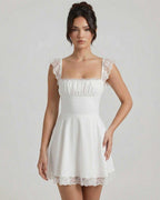 Elara Mini Dress by Lauven features lace cap sleeves and a fitted bodice, showcasing a vintage-inspired A-line silhouette.