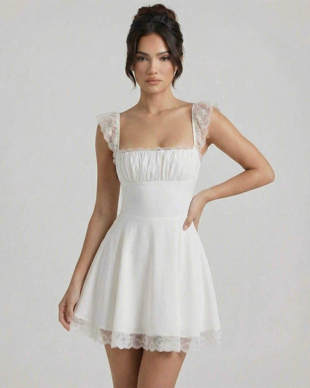 Elara Mini Dress by Lauven featuring a lace A-line silhouette with structured bodice and delicate cap sleeves.