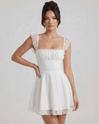 Elara Mini Dress by Lauven featuring lace cap sleeves and A-line silhouette in white linen-blend fabric.