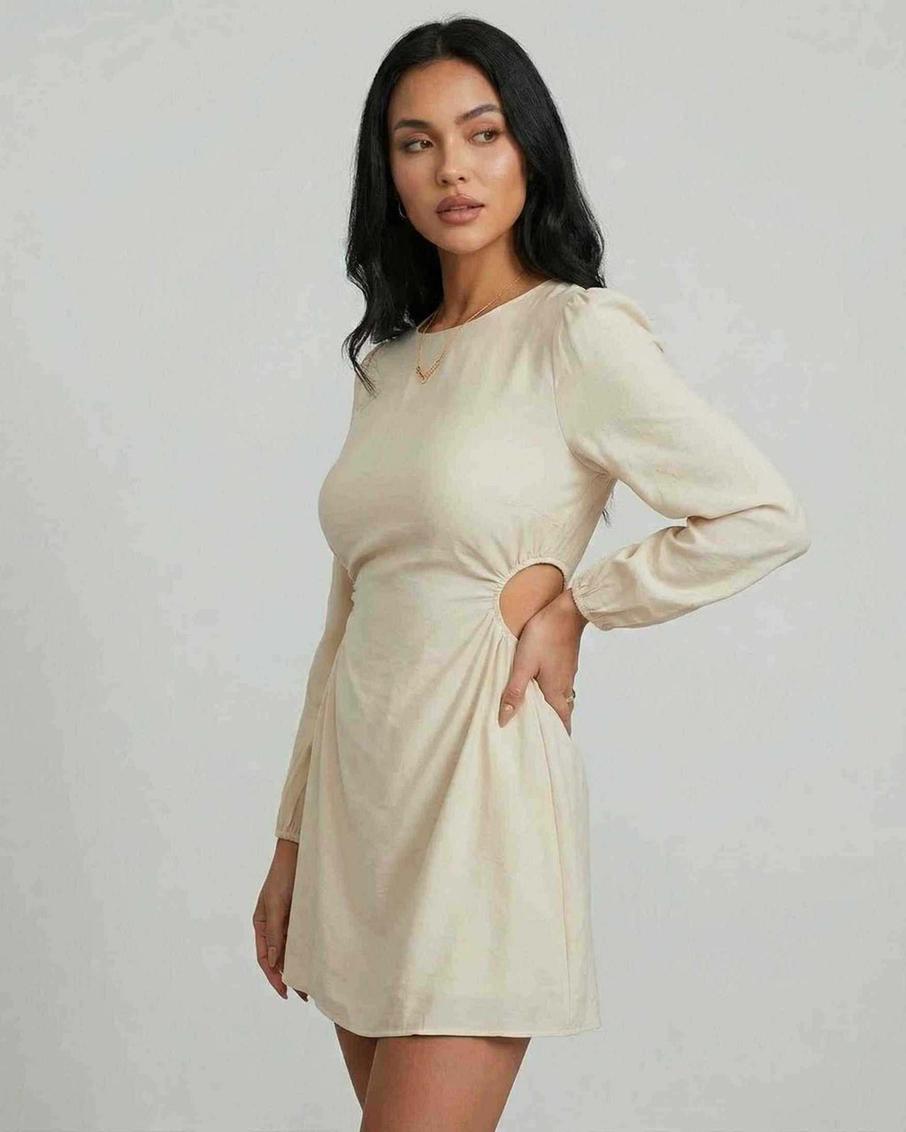 Lauven Elara Mini Dress with long sleeves and cut-out detail, perfect for autumn and winter styling.