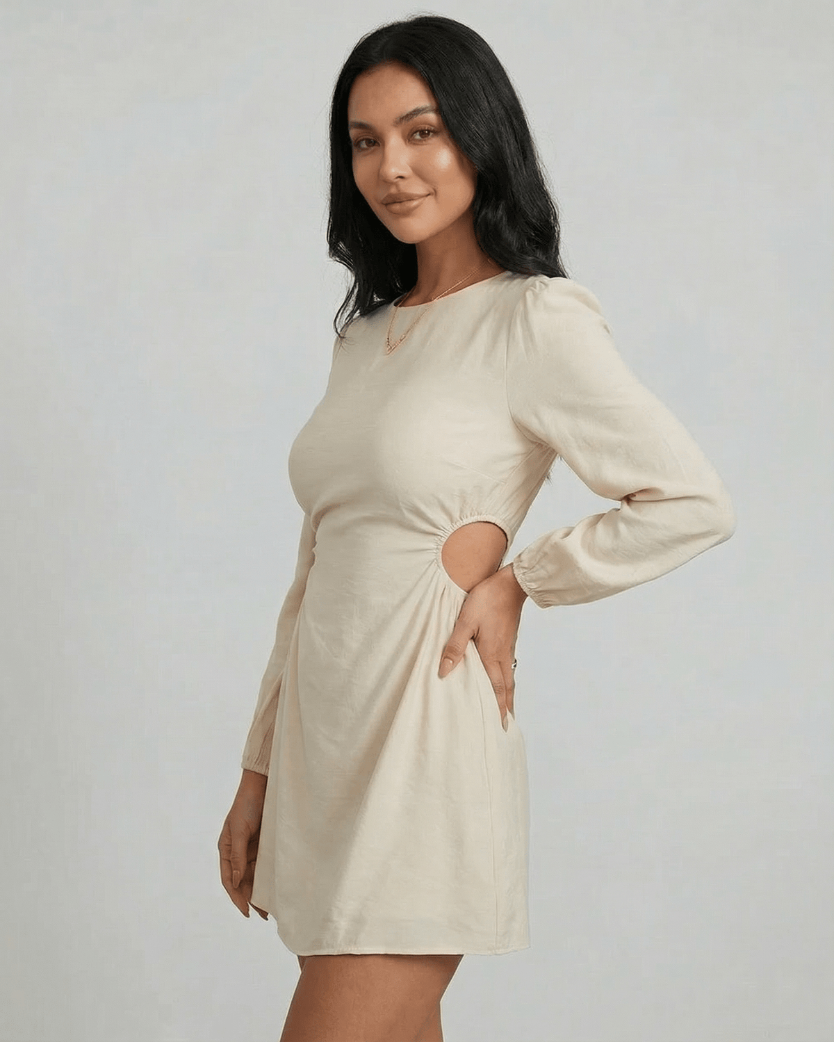 Elara Mini Dress by Lauven featuring a long sleeve A-line silhouette with cut-out detail, perfect for autumn and winter styling.