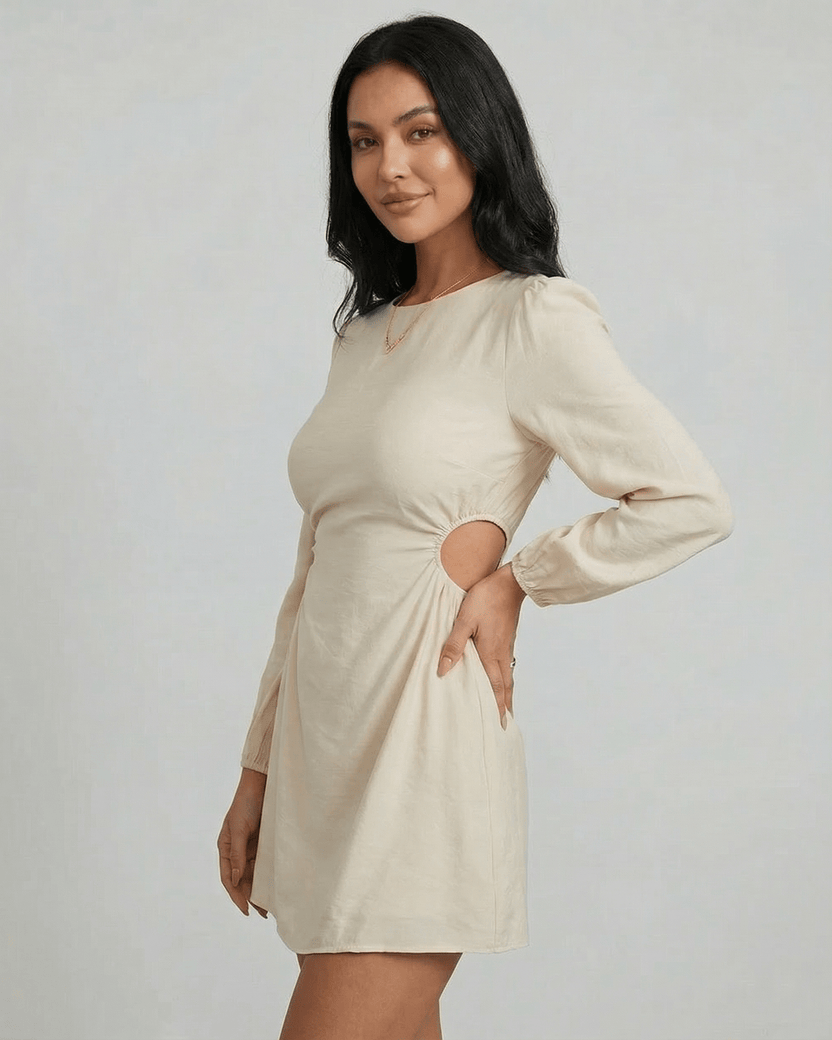 Elara Mini Dress by Lauven featuring a long sleeve A-line silhouette with cut-out detail, perfect for autumn and winter styling.