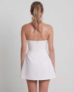 Elara Mini Dress - Elegant white strapless mini dress with structured A-line silhouette from Lauven.