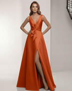 Elaris Maxi Dress: Elegant orange satin dress with A-line silhouette, wrap slit, bow waist from Lauven, perfect for vibrant occasions.