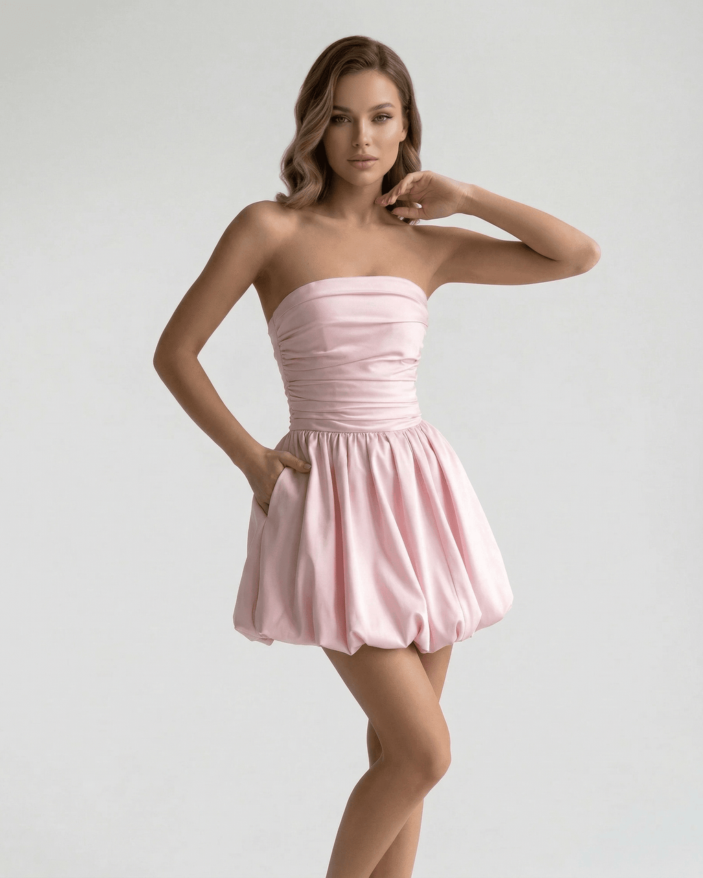 Elysia Mini Dress by Lauven – Elegant strapless pink A-line mini dress with pockets for a chic summer style.