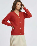 Ember Cardigan by Lauven in vibrant red with long sleeves and button-down front, showcasing a stylish silhouette.
