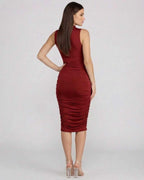 Lauven Ember Midi Dress in burgundy, showcasing a form-fitting silhouette and elegant ruched detailing from the back.