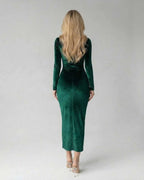 Emerald Midi Dress by Lauven showcasing sleek silhouette and ruched detailing from the back view.