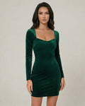Emerald Mini Dress by Lauven featuring a luxurious green velvet bodycon design with long sleeves and square neckline.