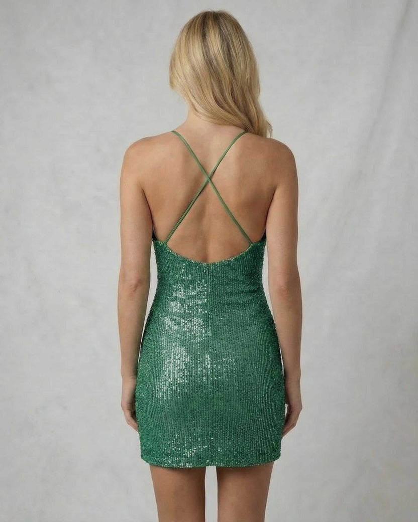 Emerald Mini Dress by Lauven, back view, showcasing luxurious sequin finish and crisscross spaghetti straps.