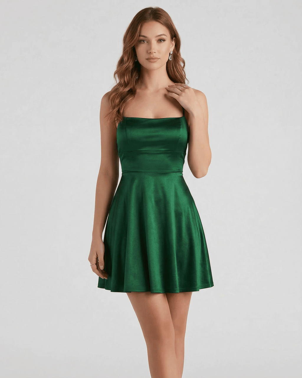 Emerald Satin Mini dress by Lauven, elegant green A-line mini dress with spaghetti straps and smooth satin finish.
