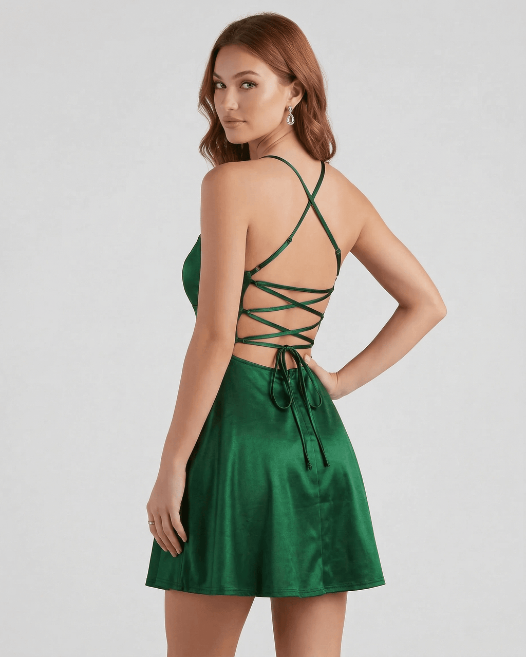 Emerald Satin Mini dress by Lauven, showcasing a stylish A-line design with a chic lace-up back detail.
