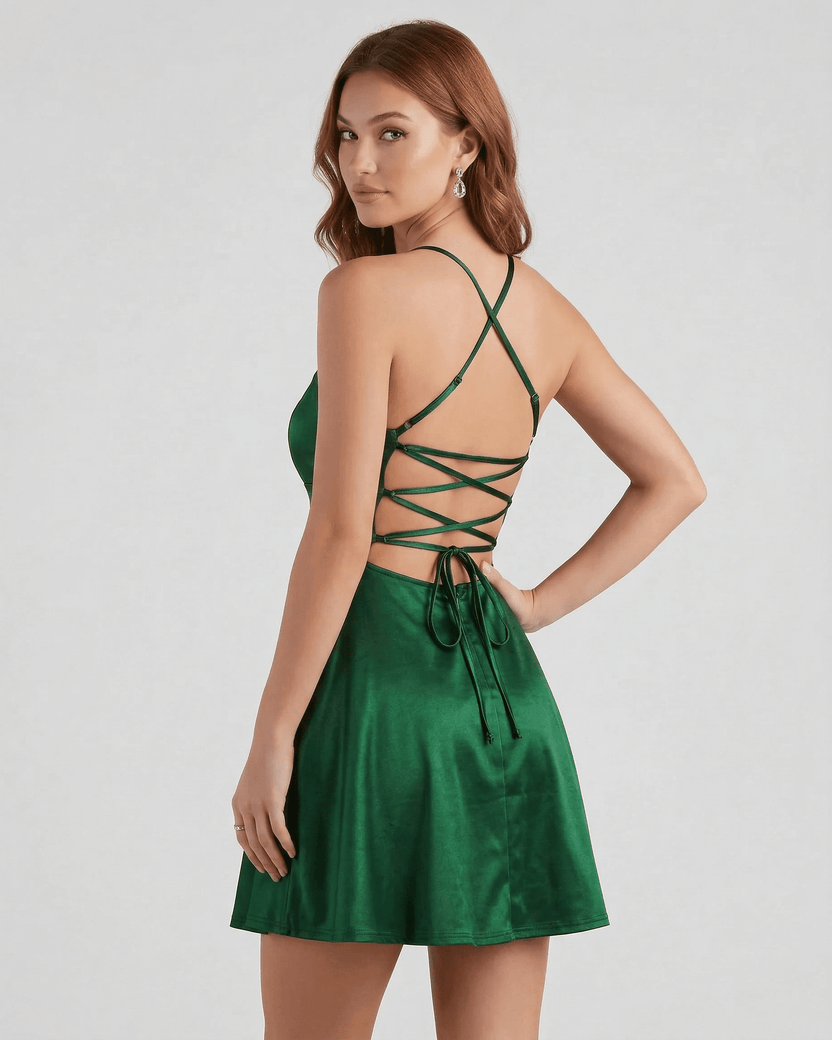 Emerald Satin Mini dress by Lauven, showcasing a stylish A-line design with a chic lace-up back detail.