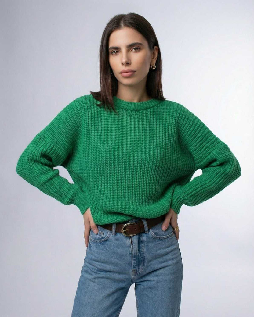 Model wearing the Lauven Emerald Sweater in vibrant green, showcasing relaxed ribbed knit and modern silhouette.