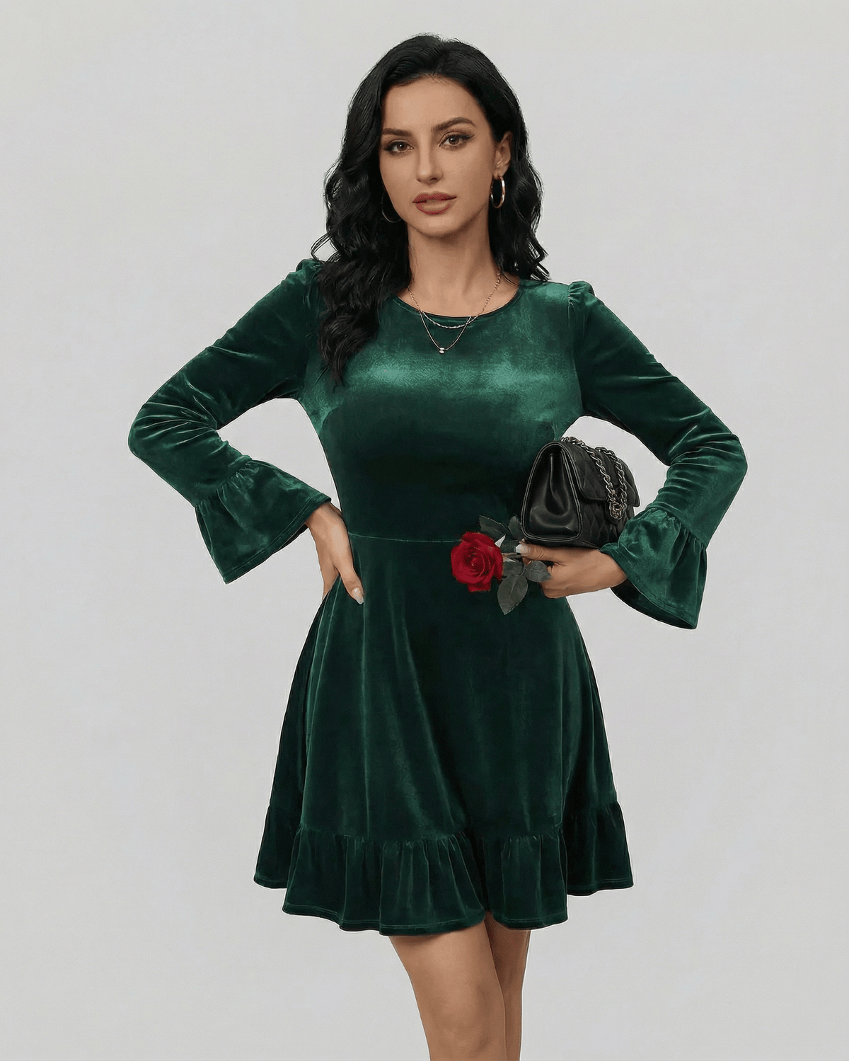 Emeraldia Mini Dress by Lauven in deep green with long sleeves and ruffled hem, perfect for autumn and winter styling.