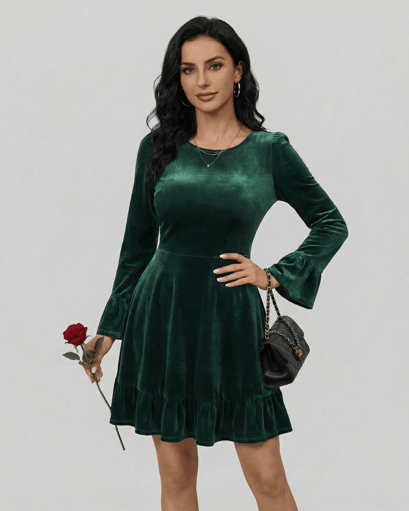 Emeraldia Mini Dress by Lauven, featuring long sleeves, A-line silhouette, and deep green velvet fabric.