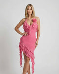 Flora Mini Dress by Lauven in soft pink polyester with ruffle detail and halter-neck design.