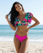 Florence Two-Piece Swimsuit by Lauven, vibrant pink floral design with deep V-neckline, perfect for beach days.