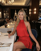 Scarlet Mini Dress by Lauven, featuring a pleated chiffon design and elevated halter neckline, perfect for elegant dining.