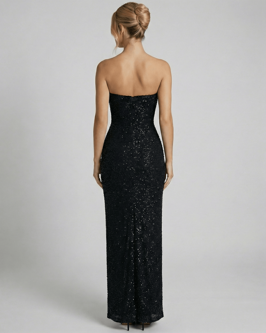 Back view of the Lauven Orion Maxi Dress showcasing its sleek bandeau silhouette and embellished detailing.