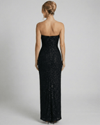 Back view of the Lauven Orion Maxi Dress showcasing its sleek bandeau silhouette and embellished detailing.