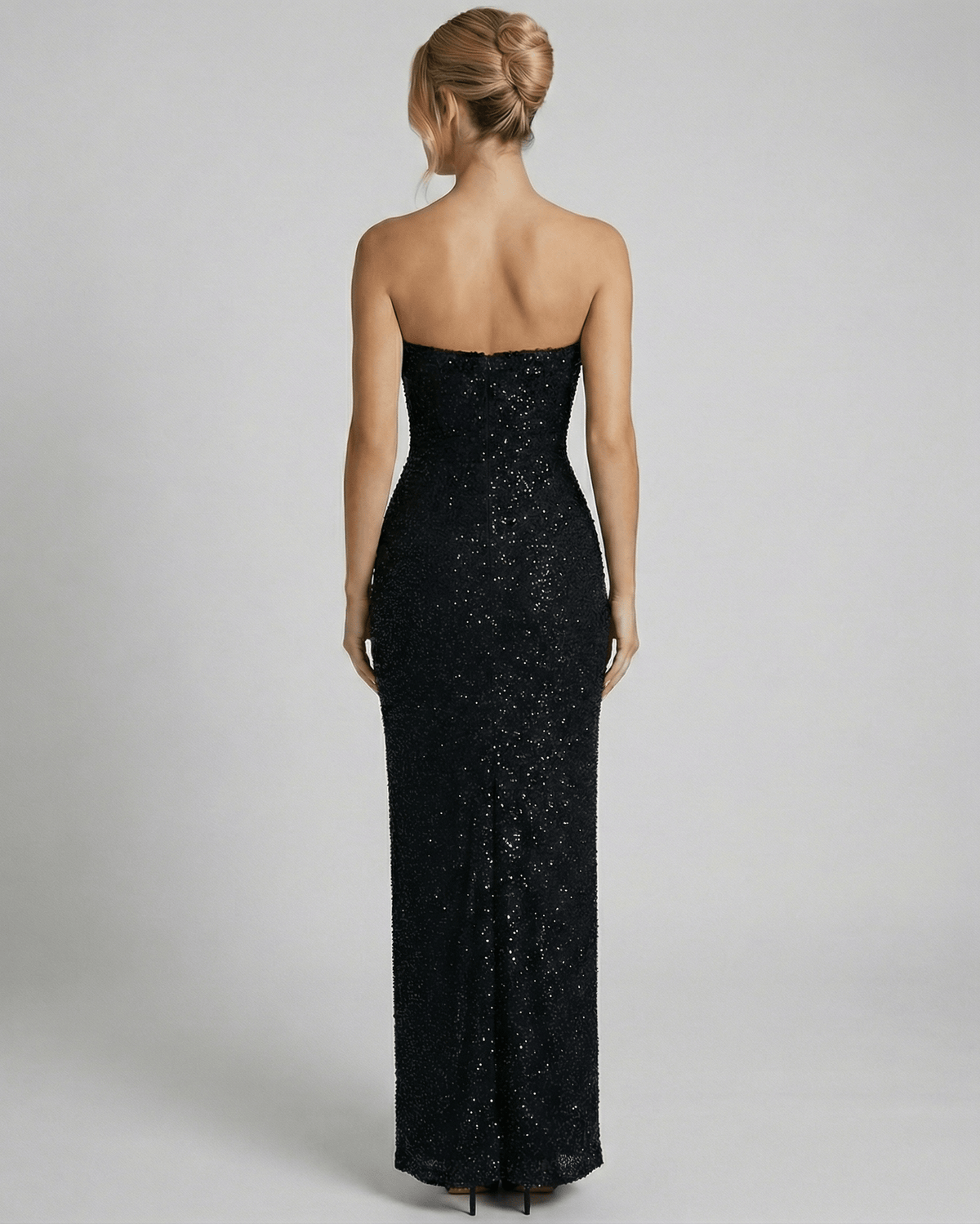 Back view of the Lauven Orion Maxi Dress showcasing its sleek bandeau silhouette and embellished detailing.