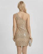 Monaco Mini Dress by Lauven, showcasing a one shoulder sequin bodycon style with tassel fringe in gold.