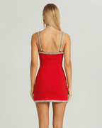 Lauven Orion Mini Dress in red with crystal trim detailing, showcasing a fitted style from the back.