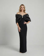 Lauven Celeste Maxi Dress featuring dramatic bow and elegant silhouette in black fabric.
