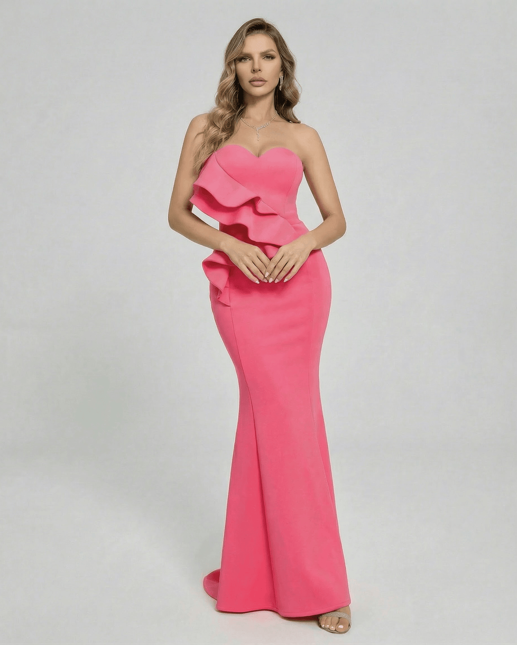 Celeste Maxi Dress by Lauven featuring elegant ruffle detail in vibrant pink, perfect for special occasions.