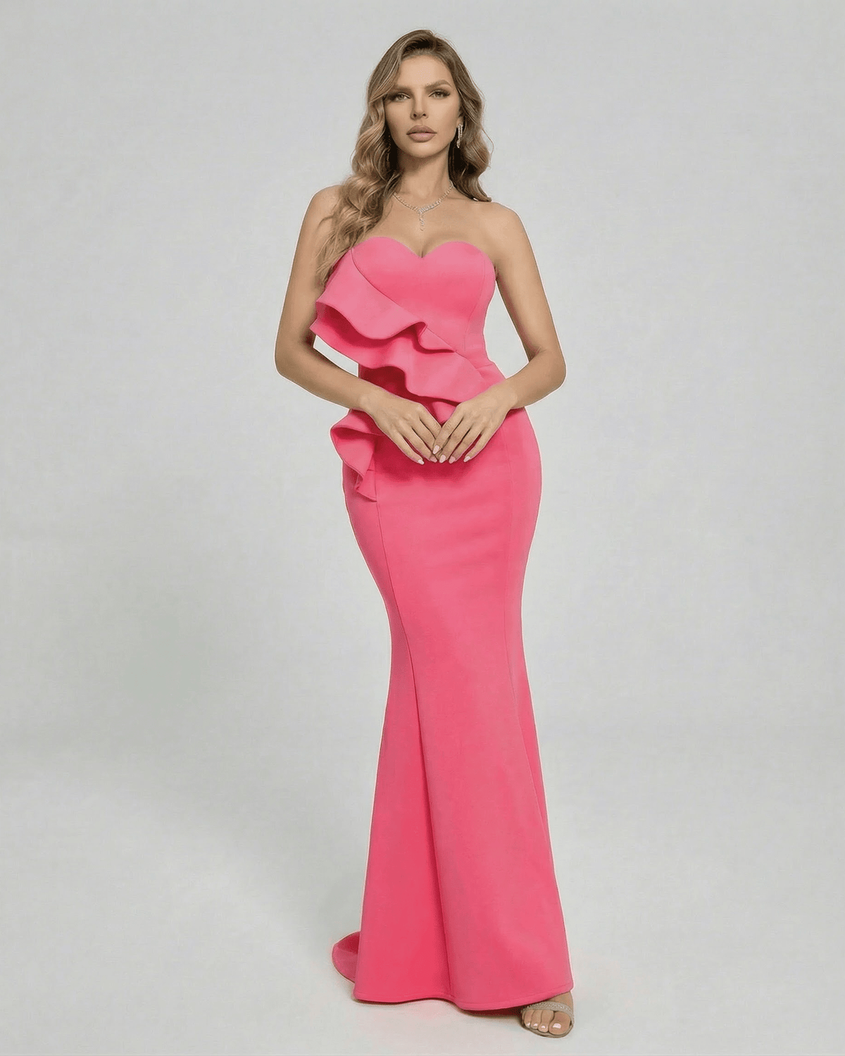 Celeste Maxi Dress by Lauven featuring elegant ruffle detail in vibrant pink, perfect for special occasions.