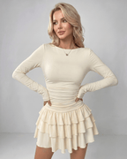 Aurevia Mini Dress by Lauven — stretch long sleeve round neck fitted mini dress with ruffle hem